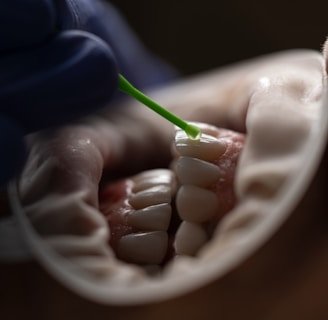 a person holding a green tube